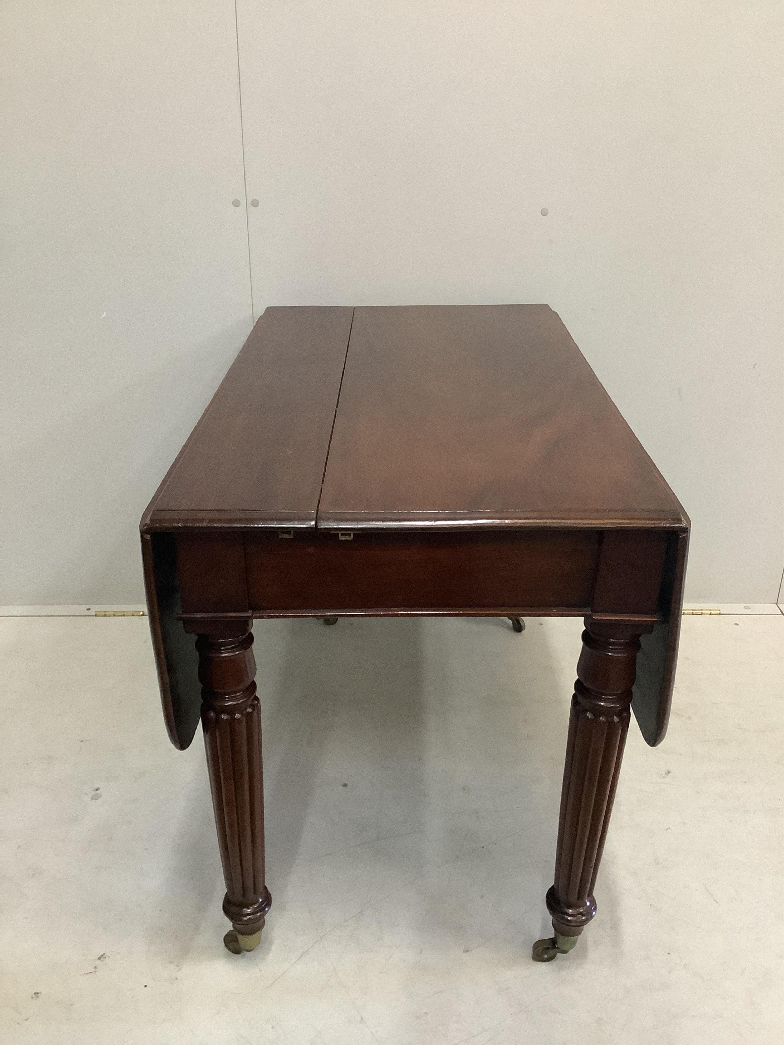 A George IV mahogany drop flap extending dining table, width 228cm extended, two spare leaves, depth 102cm, height 73cm